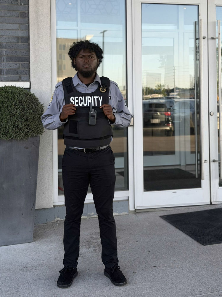 Retail security guard at a storefront